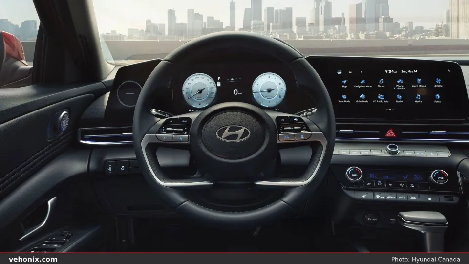2026 Hyundai Elantra cockpit with dual screens and city skyline ahead