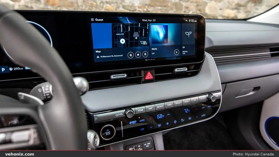 2026 Hyundai IONIQ 5 dual-screen dashboard and steering wheel at dusk