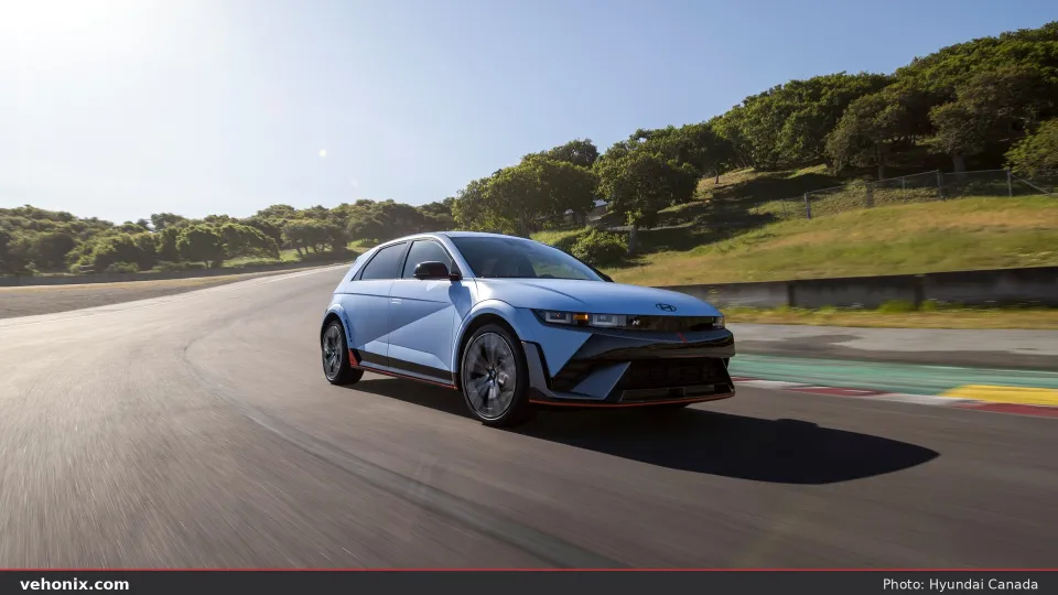 2026 Hyundai IONIQ 5 N in Performance Blue, side profile on a racetrack