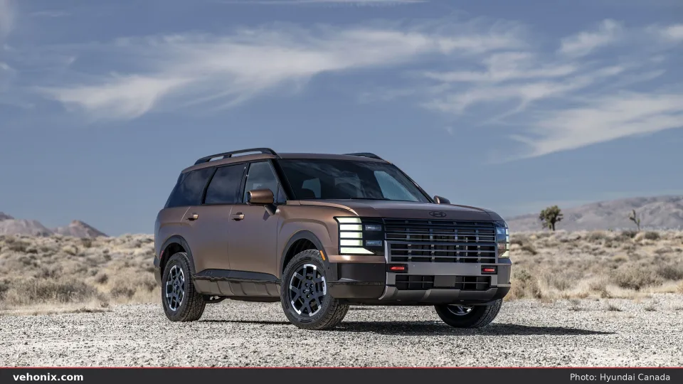 2026 Hyundai Palisade XRT, side profile driving through desert terrain
