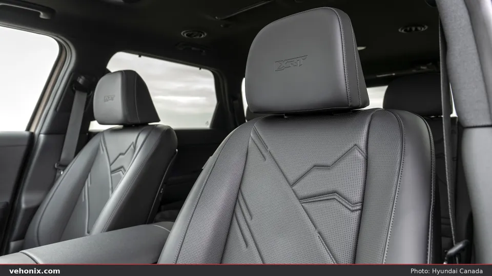 2026 Hyundai Palisade XRT dark front seats with embossed pattern