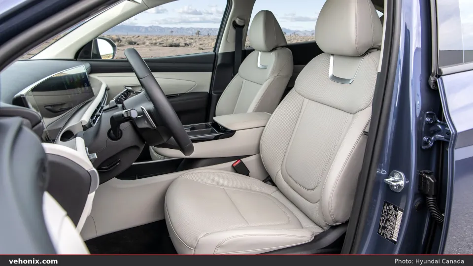 2026 Hyundai Tucson in blue, side profile in a desert landscape
