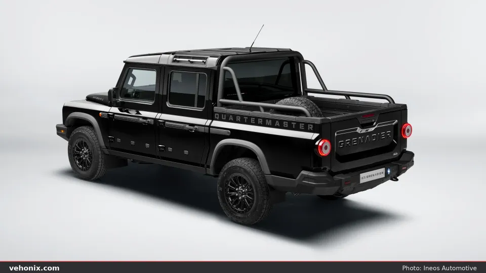 2026 Ineos Grenadier Quartermaster Black in black, rear three-quarter exterior