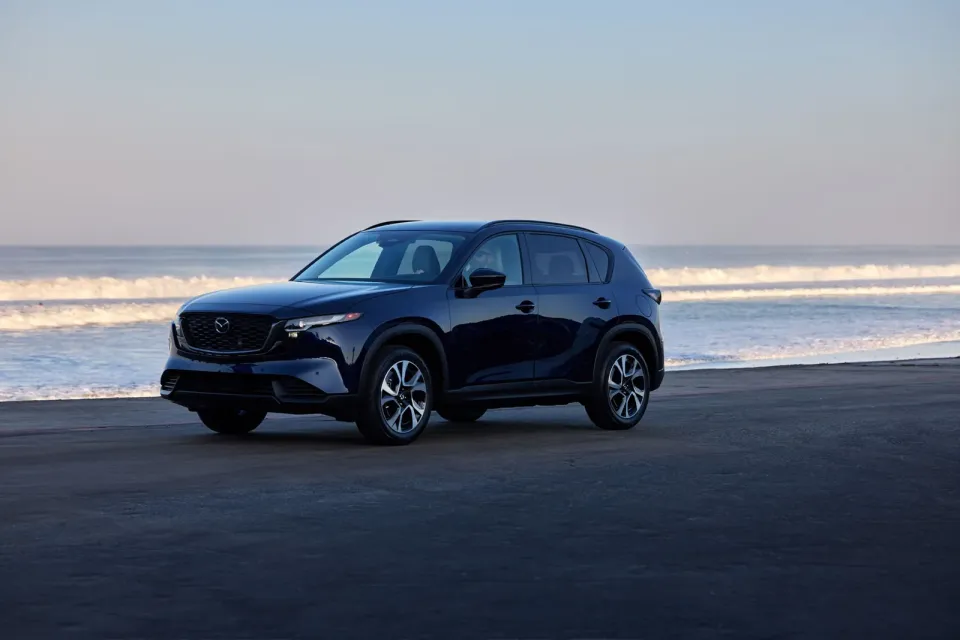 2026 Mazda CX-5 in dark blue, front three-quarter view