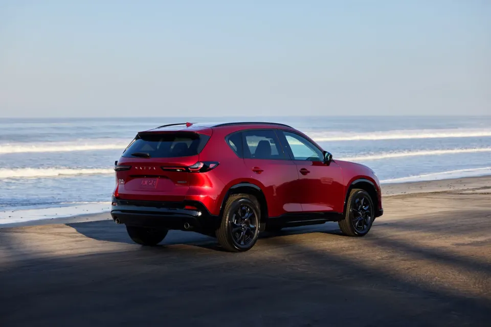 2026 Mazda CX-5 in red, rear three-quarter view
