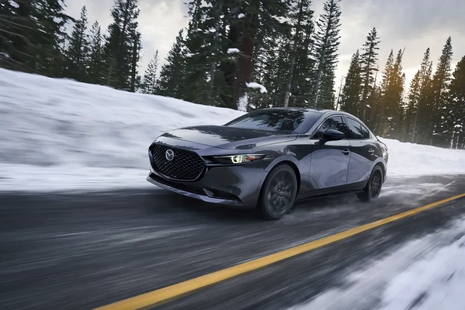 2026 Mazda3 sedan with i-Activ AWD on a snowy road