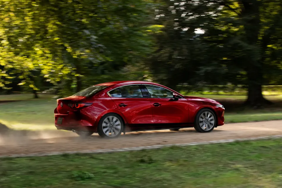 2026 Mazda3 sedan GT in red on the road