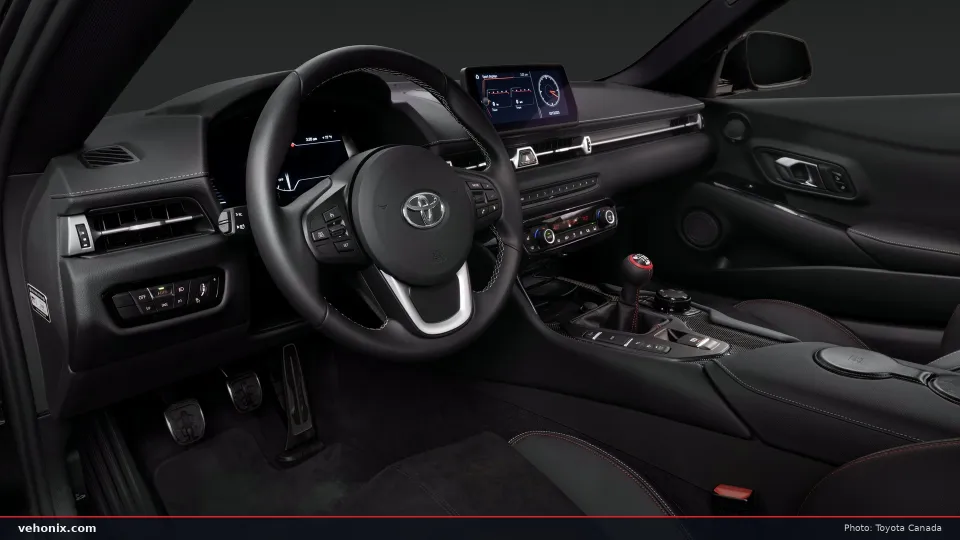 2026 Toyota GR Supra 3.0 MkV Final Edition dashboard and steering wheel from the passenger side