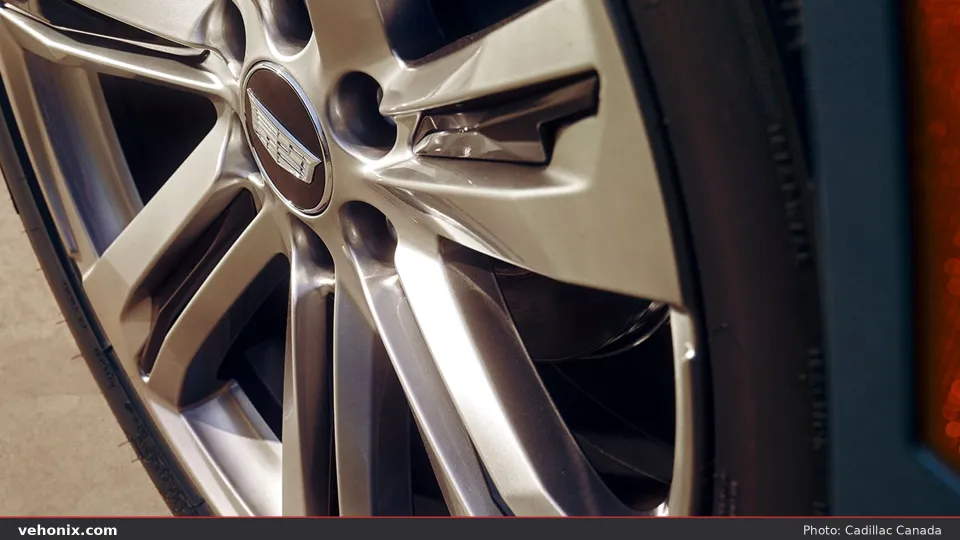 2026 Cadillac Escalade multi-spoke alloy wheel with Cadillac crest center cap