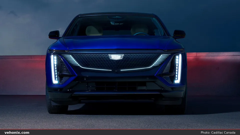 2026 Cadillac LYRIQ in deep blue, head-on with illuminated Black Crystal Shield