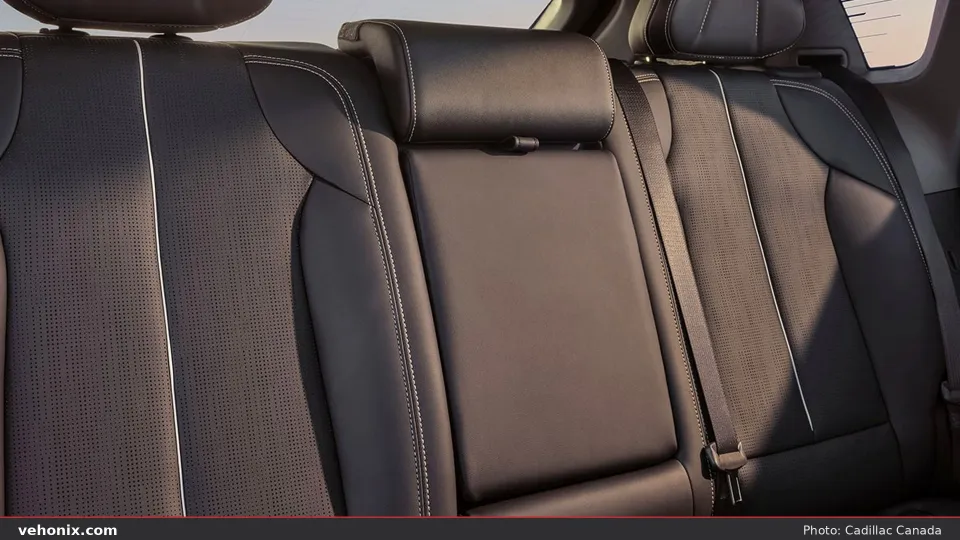 2026 Cadillac OPTIQ rear bench seats in dark upholstery with light contrast stitching