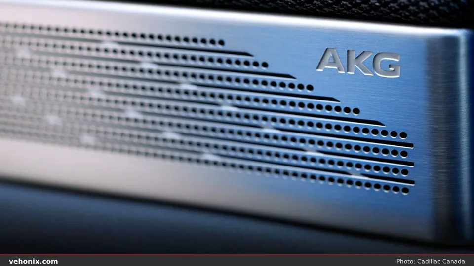 2026 Cadillac OPTIQ-V AKG brushed-metal speaker grille on the cabin trim