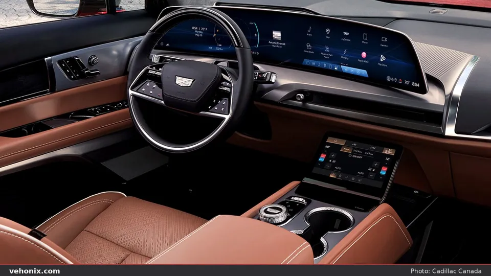 2026 Cadillac VISTIQ tan leather cockpit with curved display and rotary controller