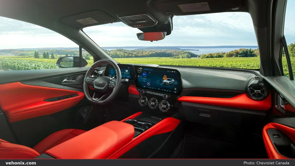 2026 Chevrolet Blazer EV cockpit with red accents and dual digital displays
