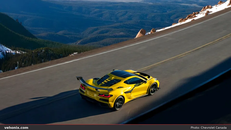 2026 Chevrolet Corvette ZR1 in yellow, overhead view on a mountain road