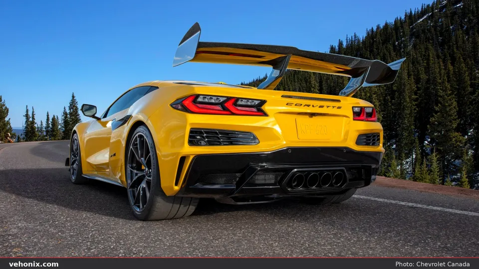 2026 Chevrolet Corvette ZR1 in yellow, rear three-quarter view with wing