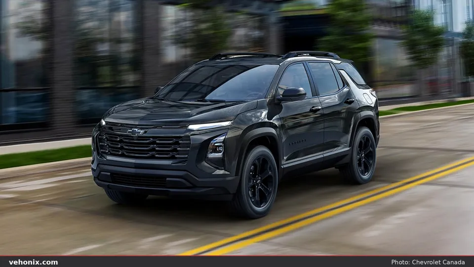 2026 Chevrolet Equinox in black, front three-quarter view on a city street
