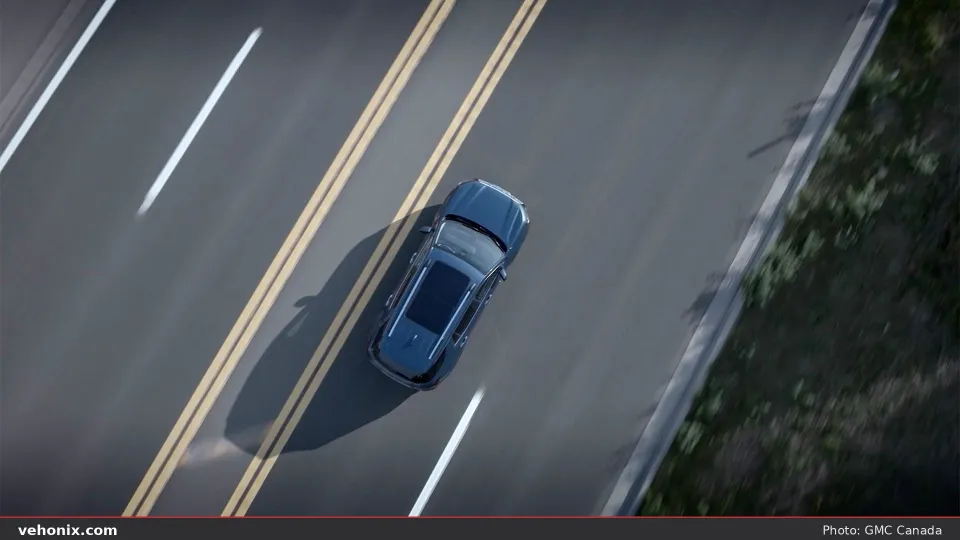 2026 GMC Terrain Denali aerial top-down view on a highway