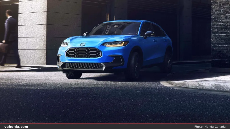 2026 Honda HR-V Sport in Boost Blue Pearl, front three-quarter on a city street