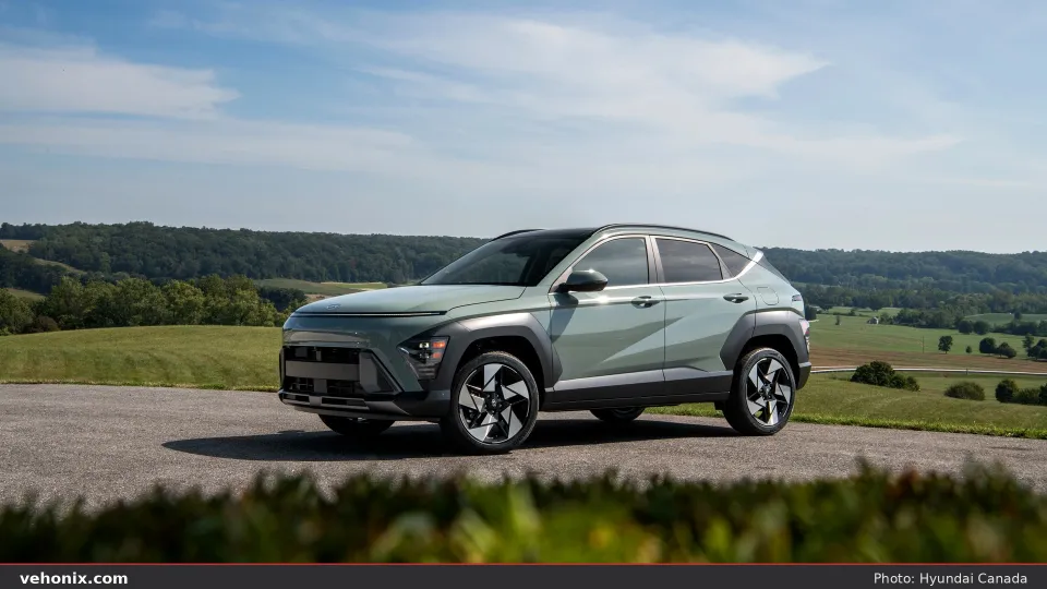 2026 Hyundai Kona in sage green, front three-quarter on a country road