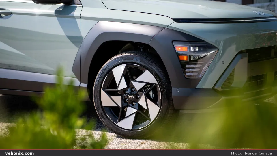 2026 Hyundai Kona in sage green, low front three-quarter on pavement