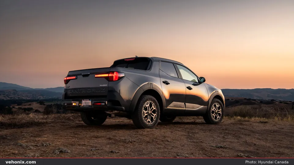 2026 Hyundai Santa Cruz in dark grey, side profile at golden hour