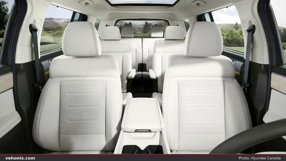 2026 Hyundai Santa Fe three-row light leather cabin looking rearward