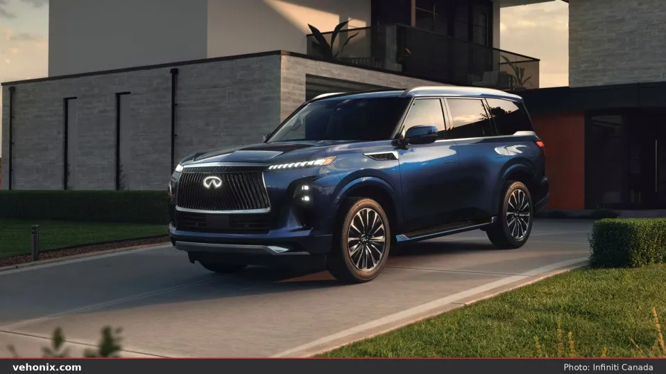 2026 Infiniti QX80 in deep blue, front three-quarter exterior