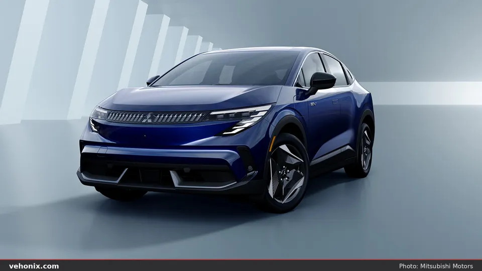 Blue 2027 Mitsubishi Eclipse Sportback EV electric crossover, front three-quarter view in a studio