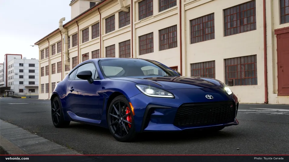 2026 Toyota GR86 Premium in Trueno Blue, front view by a historic building