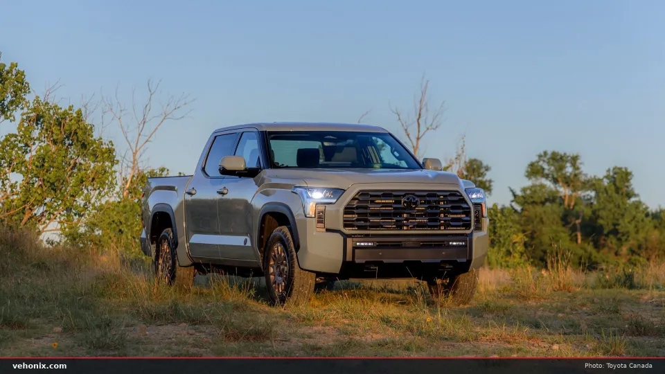 2026 Toyota Tundra Trailhunter in grey, front view with trees behind