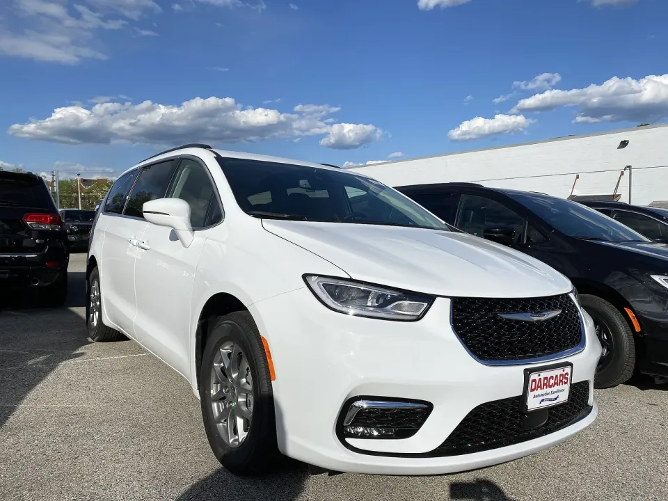 A white 2021 Chrysler Pacifica minivan parked outside