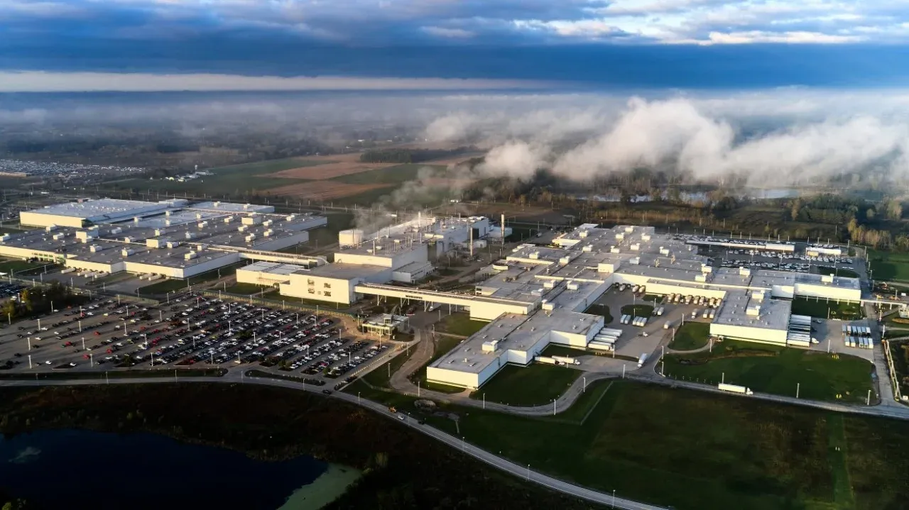 Aerial view of the GM Lansing Delta Township Assembly plant in Michigan, with fog in the fields behind it
